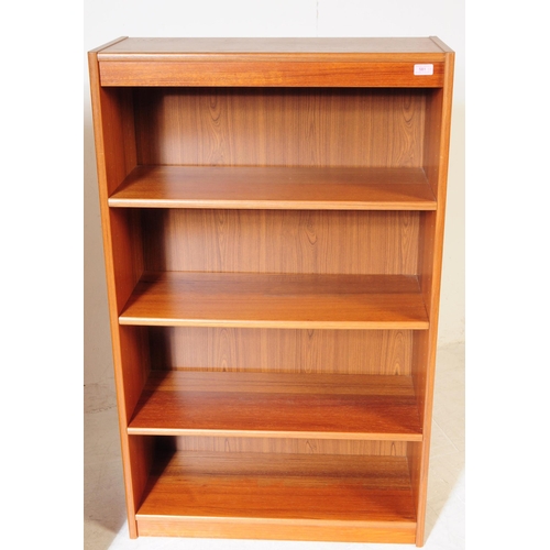 581 - British Modern Design - A pair of mid 20th century teak veneer open faced bookcases. The bookcases e... 