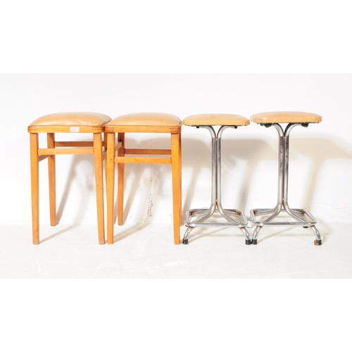 582 - British Modern Design - Two pairs of vintage 20th century bar / kitchen stools. Having leatherette c... 