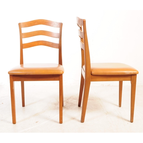 583 - Nathan Furniture - Retro mid century set of four dining chairs. Having arched slatted back rest on l... 