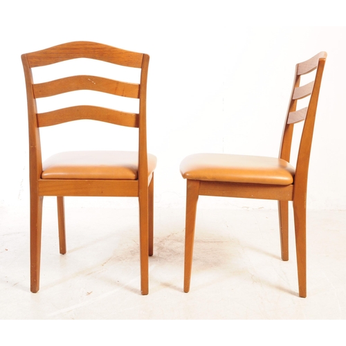 583 - Nathan Furniture - Retro mid century set of four dining chairs. Having arched slatted back rest on l... 