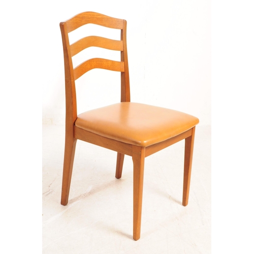 583 - Nathan Furniture - Retro mid century set of four dining chairs. Having arched slatted back rest on l... 