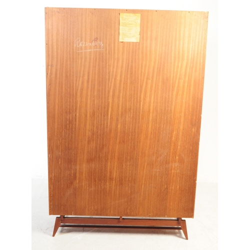 590 - Meredew Furniture - A mid 20th century Meredew Furniture teak veneer double wardrobe. The wardrobe r... 