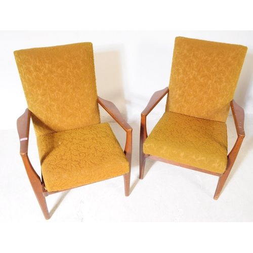 592 - Parker Knoll - Model PK 873/4 - A pair of mid 20th century Parker Knoll PK873/4 armchairs. The armch... 