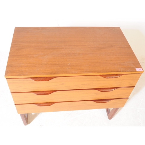 595 - Europa Furniture - A mid 20th century Europa Furniture teak veneer chest of drawers and dressing tab... 