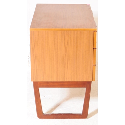 595 - Europa Furniture - A mid 20th century Europa Furniture teak veneer chest of drawers and dressing tab... 