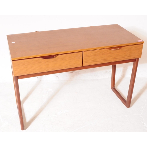 595 - Europa Furniture - A mid 20th century Europa Furniture teak veneer chest of drawers and dressing tab... 