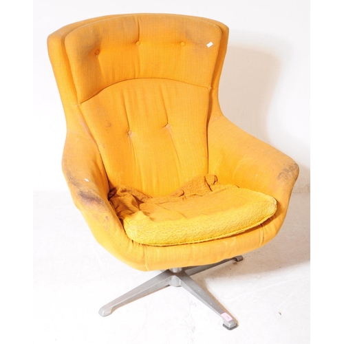 596 - British Modern Design - A mid 20th century circa 1960s swivel egg lounge armchair. The chair raised ... 