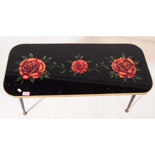 601 - British Modern Design - Mid century coffee table. Of curved rectangular form, glass top with rose fl... 