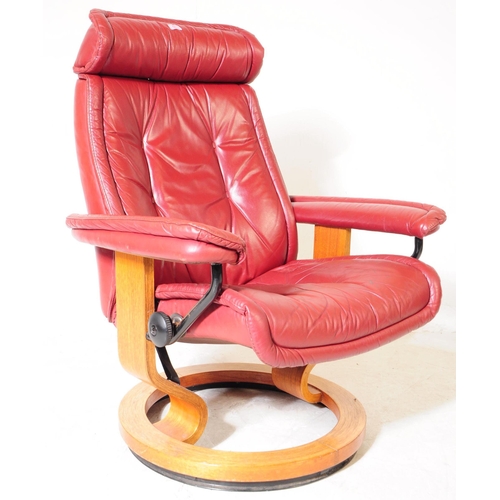 626 - Stressless Ekornes - A mid century red leather swivel easy armchair. Button back, backrest, flat cus... 