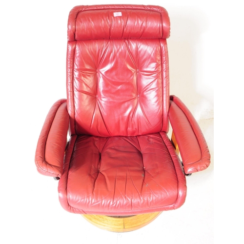 626 - Stressless Ekornes - A mid century red leather swivel easy armchair. Button back, backrest, flat cus... 