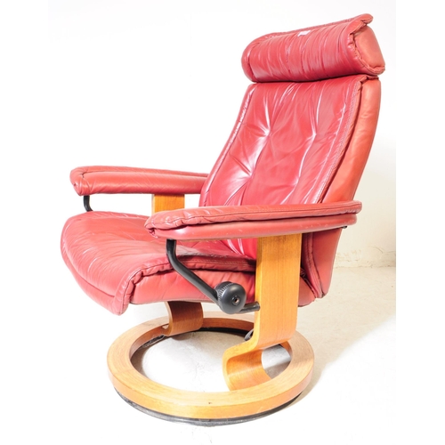 626 - Stressless Ekornes - A mid century red leather swivel easy armchair. Button back, backrest, flat cus... 