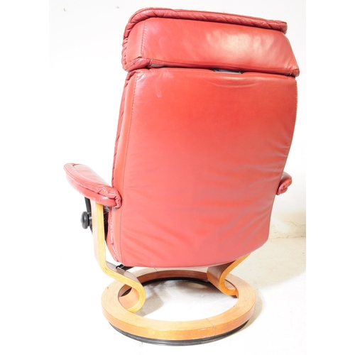 626 - Stressless Ekornes - A mid century red leather swivel easy armchair. Button back, backrest, flat cus... 