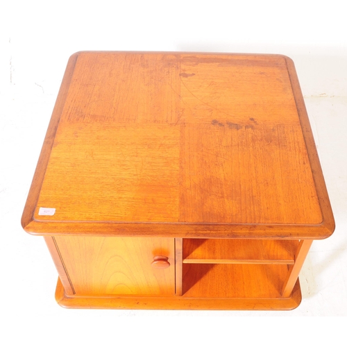 628 - Nathan Squares - A retro mid 20th century teak coffee table. Square form with configuration of pigeo... 