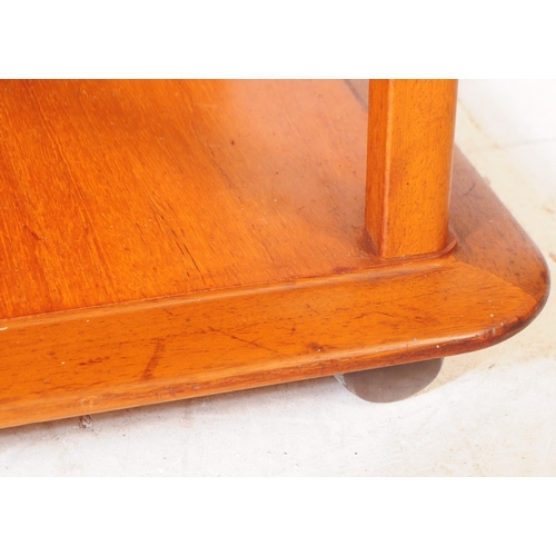 628 - Nathan Squares - A retro mid 20th century teak coffee table. Square form with configuration of pigeo... 