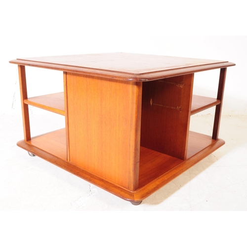 628 - Nathan Squares - A retro mid 20th century teak coffee table. Square form with configuration of pigeo... 