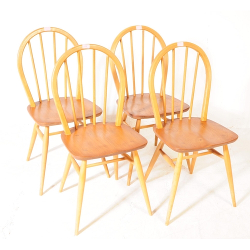 638 - Ercol Furniture - Set of four blonde windsor beech and elm dining chairs. Having stick backrest, sad... 