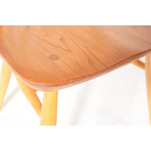 638 - Ercol Furniture - Set of four blonde windsor beech and elm dining chairs. Having stick backrest, sad... 