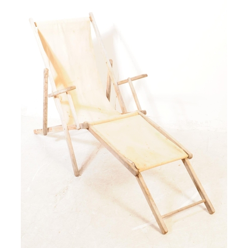 639 - A group of four vintage 20th century beech / garden folding deck chairs. Of teak construction with f... 