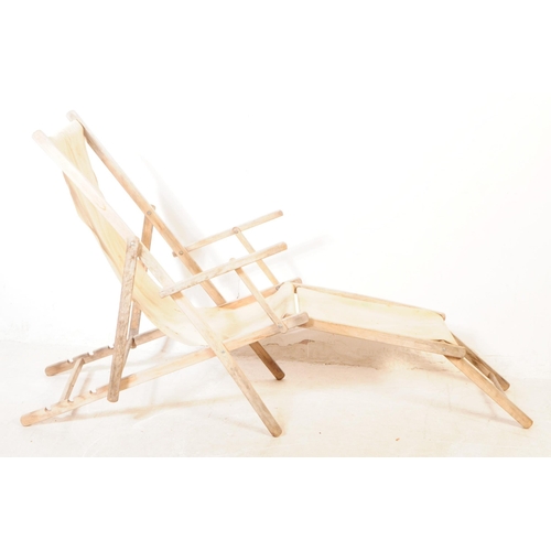 639 - A group of four vintage 20th century beech / garden folding deck chairs. Of teak construction with f... 