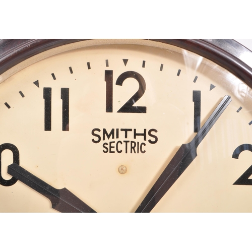 651 - Smiths - A 1940s Smiths Sectric brown bakelite wall clock, alongside another. The clock of circular ... 