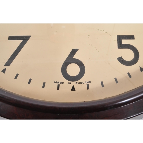 651 - Smiths - A 1940s Smiths Sectric brown bakelite wall clock, alongside another. The clock of circular ... 