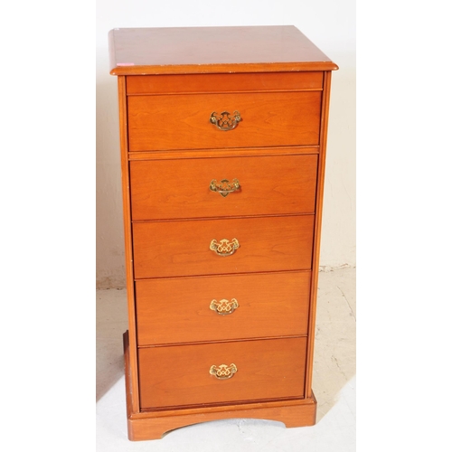 656 - Stag Furniture - A mid 20th Century stag chest of drawers having five bank of drawers, raised on pli... 