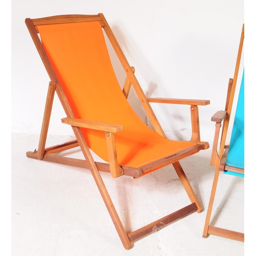 686 - Charles Bentley - A pair of contemporary hardwood garden deck chairs. Solid wood teak frames and arm... 