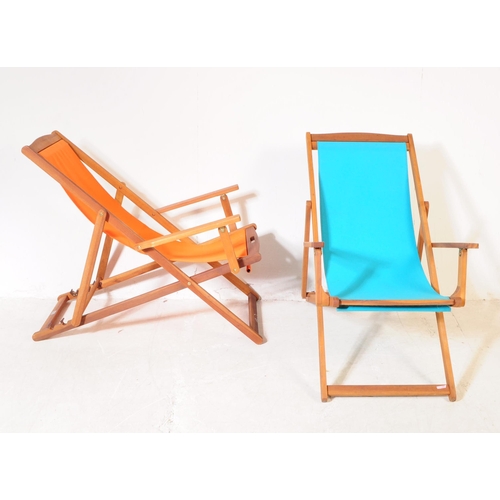 686 - Charles Bentley - A pair of contemporary hardwood garden deck chairs. Solid wood teak frames and arm... 