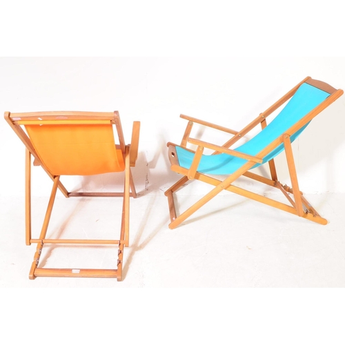 686 - Charles Bentley - A pair of contemporary hardwood garden deck chairs. Solid wood teak frames and arm... 