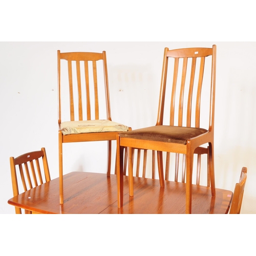 692 - Meredew Furniture - A retro mid 20th century teak extending dining table with six dining chairs (bel... 