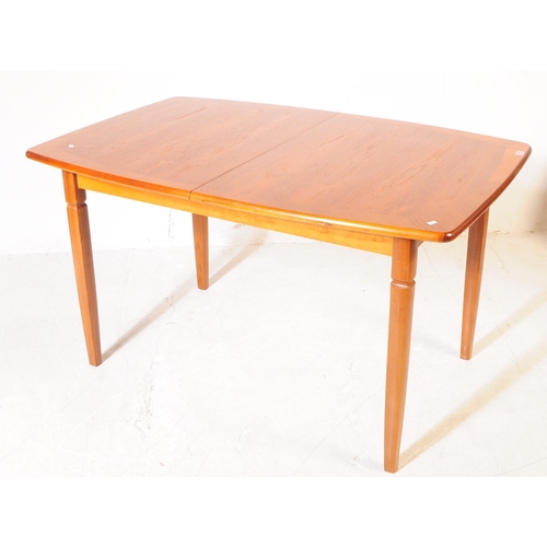 692 - Meredew Furniture - A retro mid 20th century teak extending dining table with six dining chairs (bel... 