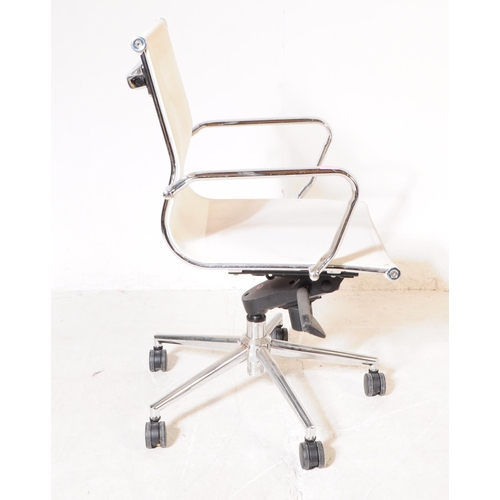 699 - A contemporary Eames 108 manner office desk chair. The chair raised on a splayed base with castors, ... 