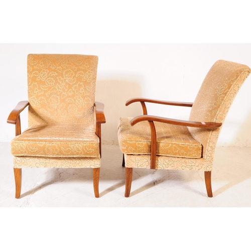 700 - Parker Knoll - A pair of mid 20th century Parker Knoll PK 717 lounge armchairs / easy chairs. The ch... 