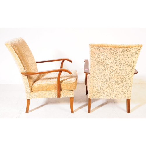 700 - Parker Knoll - A pair of mid 20th century Parker Knoll PK 717 lounge armchairs / easy chairs. The ch... 