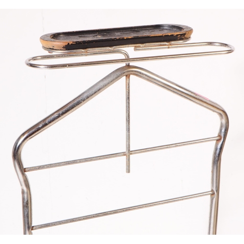 704 - A mid 20th century gentleman's chrome vanity stand. The stand having a bent metal frame, with padded... 