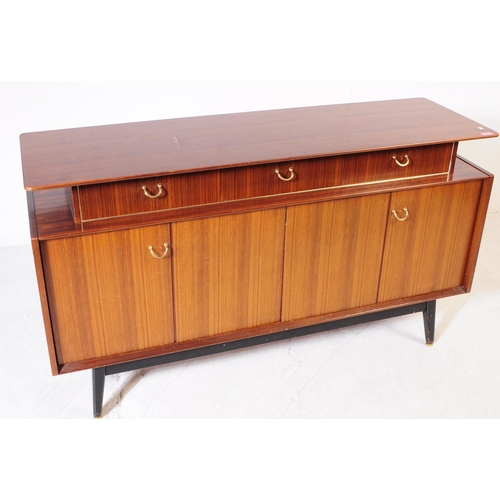 708 - G-Plan - Librenza Range - A mid 20th century G-Plan Librenza range Tola wood sideboard credenza. The... 