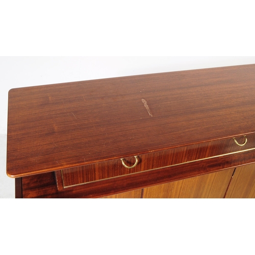 708 - G-Plan - Librenza Range - A mid 20th century G-Plan Librenza range Tola wood sideboard credenza. The... 