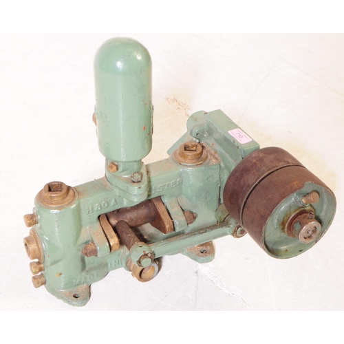 710 - Lister - A mid 20th century small proportioned Lister stationary engine / pump. The painted in in a ... 