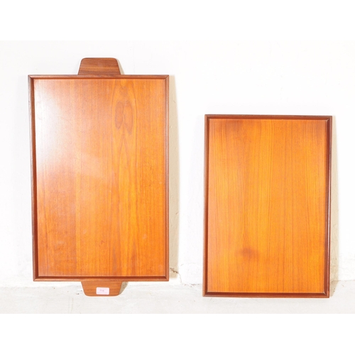 714 - British Modern Design - A mid 20th century circa 1960s teak drinks hostess cocktail trolley. The tro... 