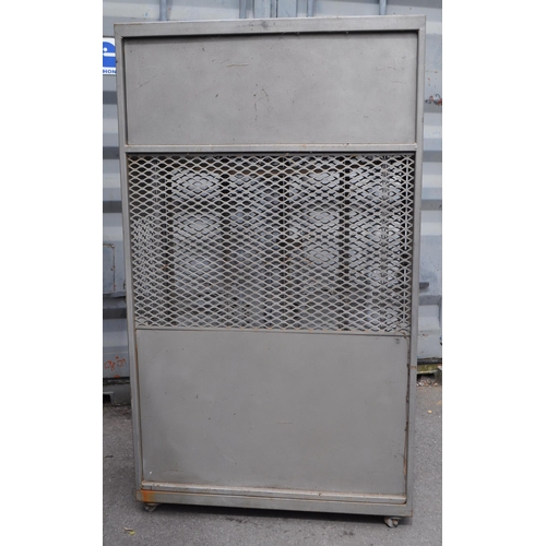 752 - A 20th Century retro industrial metal storage two door locker cage raised on castor wheels. Of recta... 