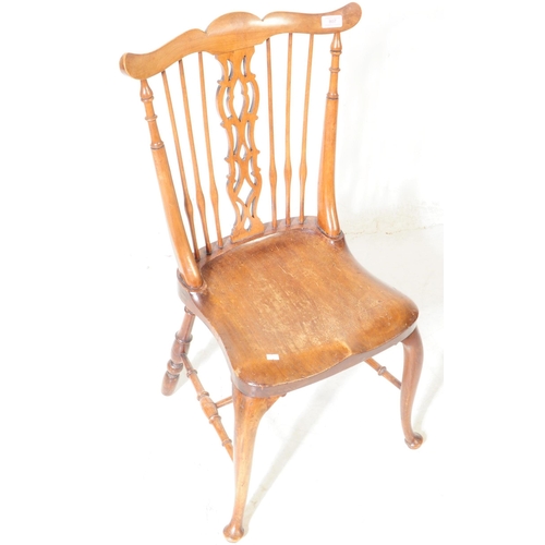 807 - A 19th century ash and elm Windsor chair. With top rail moustache style top into pierced splat spind... 