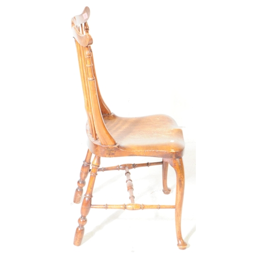 807 - A 19th century ash and elm Windsor chair. With top rail moustache style top into pierced splat spind... 