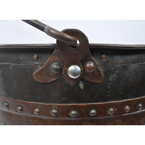 815 - A 19th century Victorian copper cooking pot / cauldron. With single curved carry handle, circular bo... 