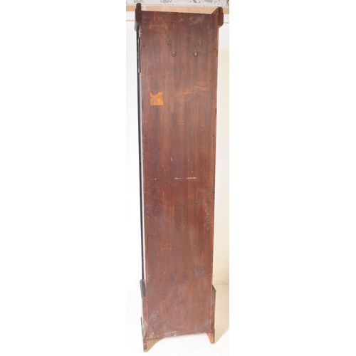 820 - An early 20th century circa 1930s Art Deco oak wood longcase grandfather clock. The clock raised on ... 