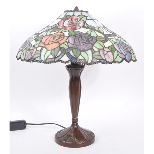 826 - A 20th Century Tiffany style table lamp light with dual lamp bulb sockets having pink and purple sta... 