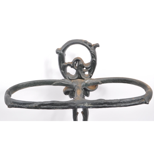 830 - A Victorian 19th century cast iron Coalbrookdale manner stick / umbrella stand. The stand raised on ... 