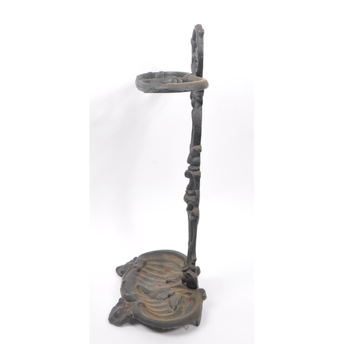 830 - A Victorian 19th century cast iron Coalbrookdale manner stick / umbrella stand. The stand raised on ... 