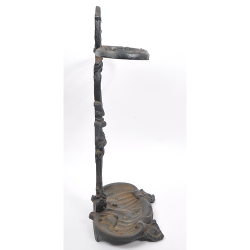 830 - A Victorian 19th century cast iron Coalbrookdale manner stick / umbrella stand. The stand raised on ... 