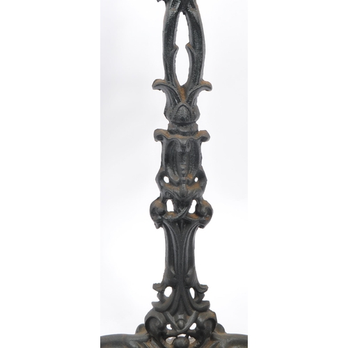 830 - A Victorian 19th century cast iron Coalbrookdale manner stick / umbrella stand. The stand raised on ... 