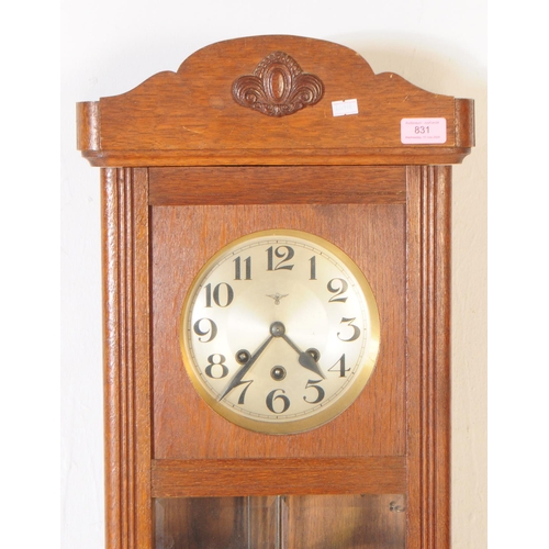 831 - Friedrich Mauthe - A 19th century FMS Mauthe 8-day movement oak cased wall clock. The clock having s... 